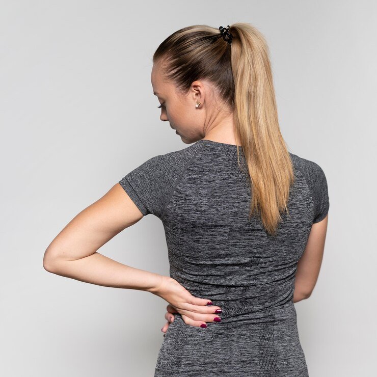 Woman With Back pain - Pain relief - Acupuncture
