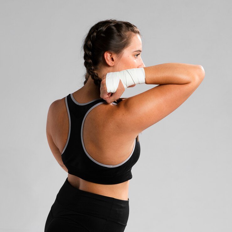 Woman having Shoulder pain - Pain relief - Acupuncture